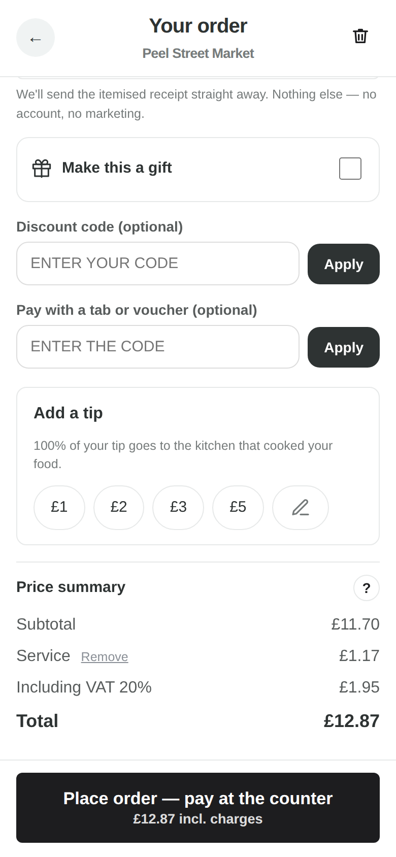 The tip box at the guest checkout: pound amounts, a write-your-own pencil, nothing pre-ticked